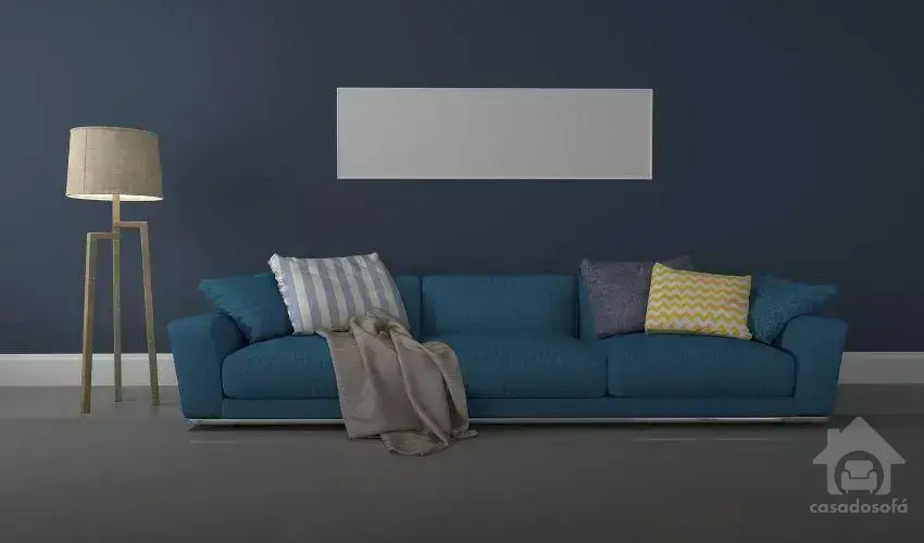 Sofá com chaise e puff